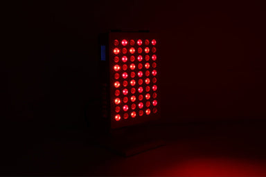 NovaRed 300W red light therapy panel with LCD display and 60 LEDs on a desktop base